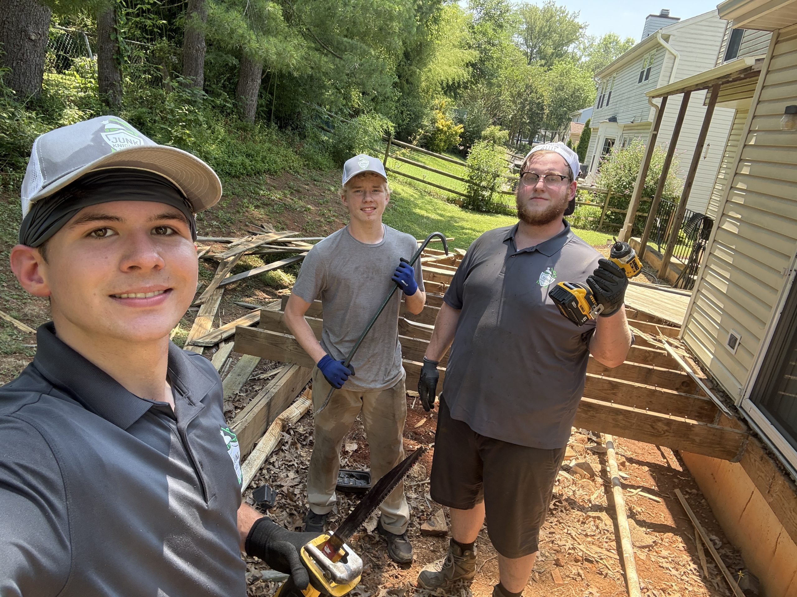 Junk Knights crew Emory, Dylan, and Evan during a deck demo