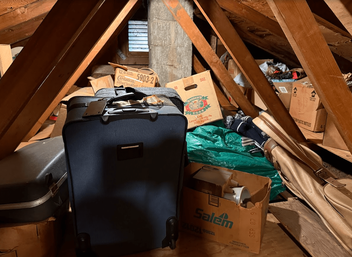 Junk in attic — the kind of cleanout we handle every month