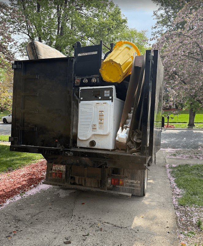 Junk Knights truck loaded with a dryer